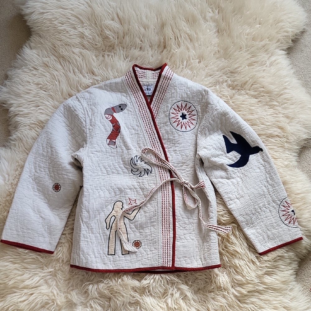 Zara Cream Quilted Wrap Jacket with Red Trim and Navy Motifs